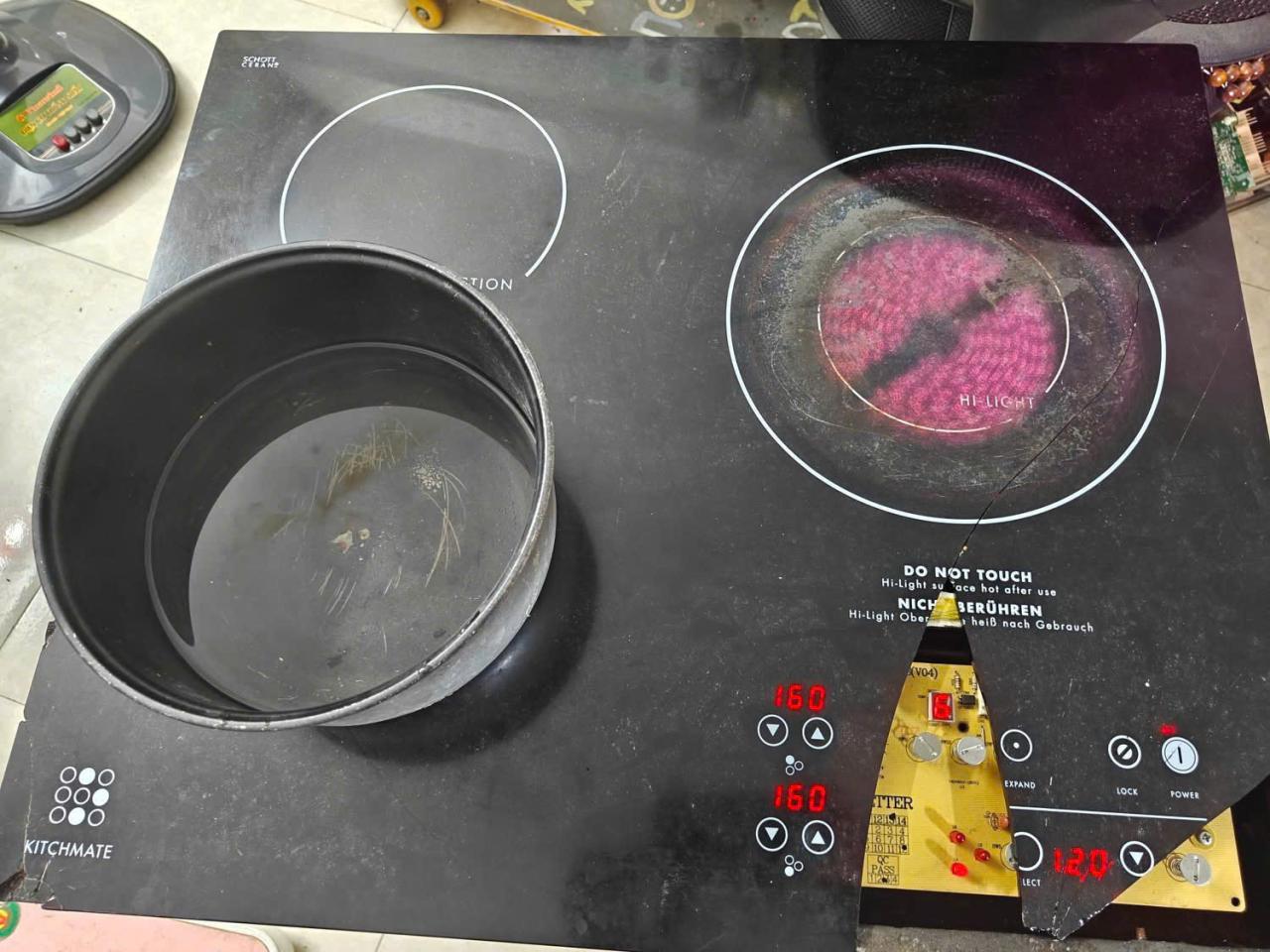 Mặt kính bếp từ Kitchmate bị vỡ do va đập mạnh